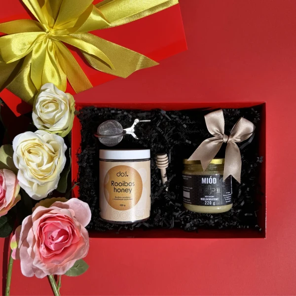Zestaw z herbatą Rooibos honey, miodem i zaparzaczem w czerwonym pudełku